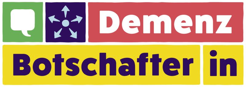 Logo mit dem Text "Demenz Botschafter in". Der Hintergrund ist bunt und enthält verschiedene Farben wie Grün, Lila, Rot und Gelb. Es vermittelt eine Botschaft zur Sensibilisierung für das Thema Demenz.